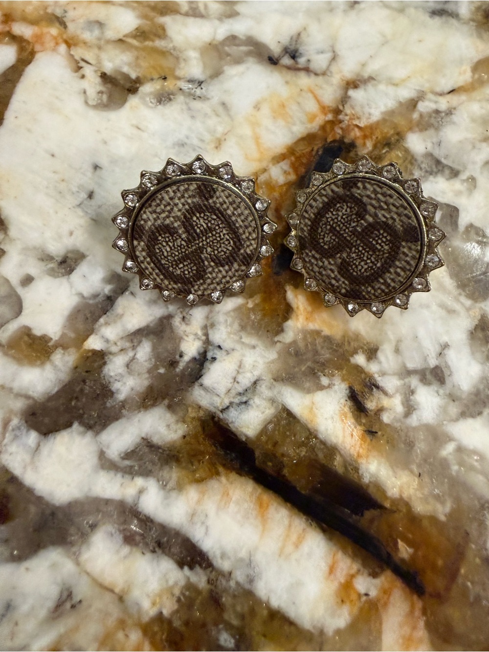 Elegant Upcycled Stud Earrings surrounded by shimmering rhinestones.